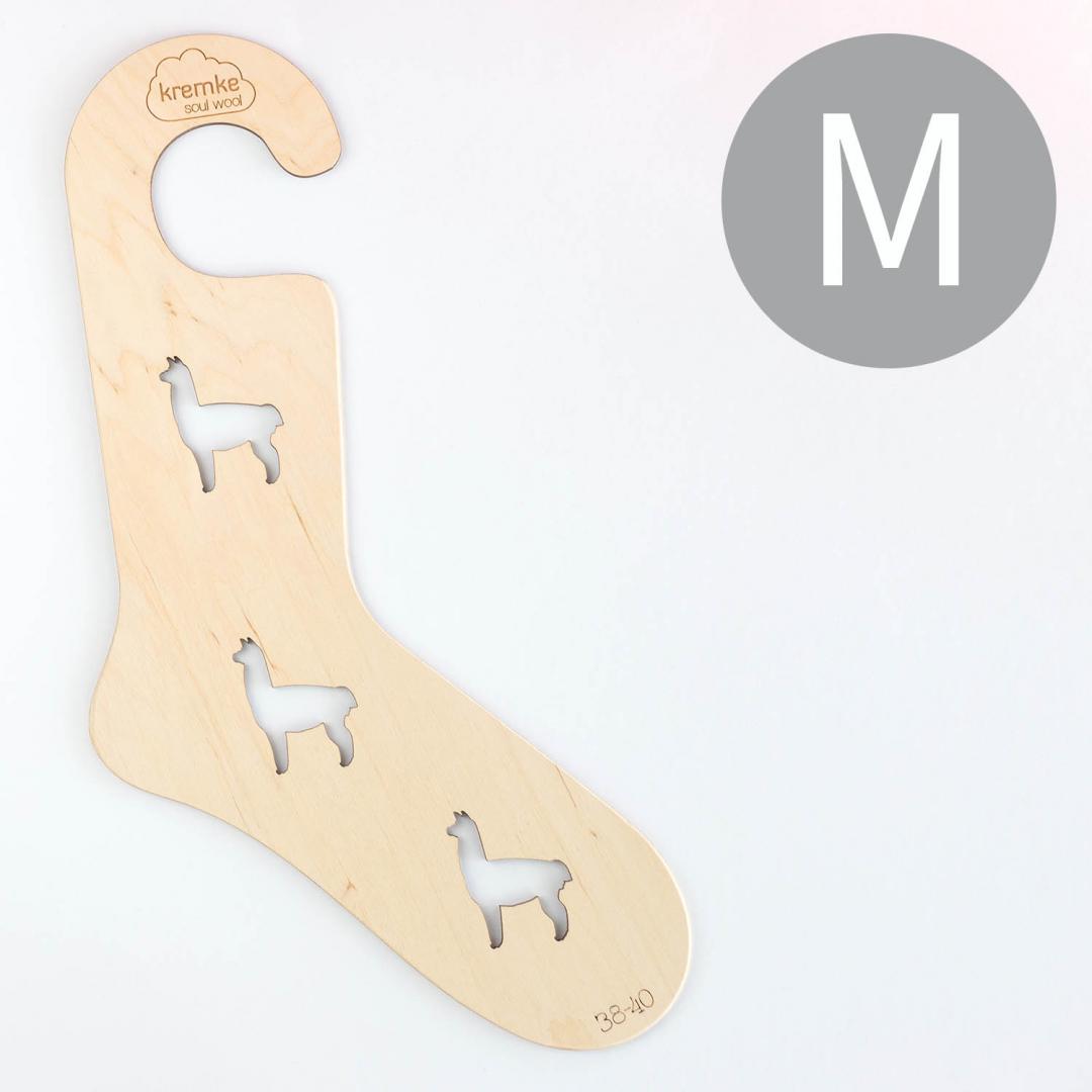 bloqueur de chaussette à anse en bois clair motif alpaga taille M