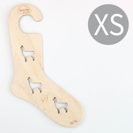 bloqueur de chaussette à anse en bois clair motif alpaga taille XS